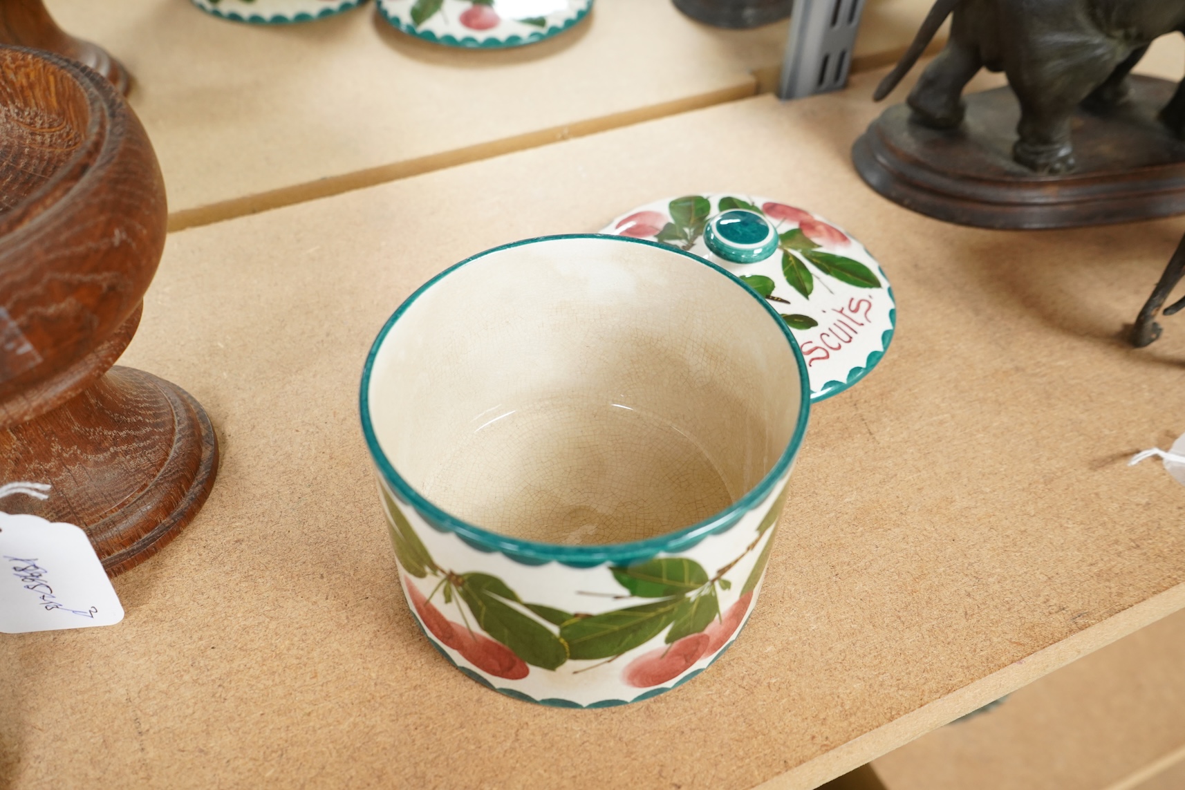 A Wemyss lidded biscuits box, 13cm diameter